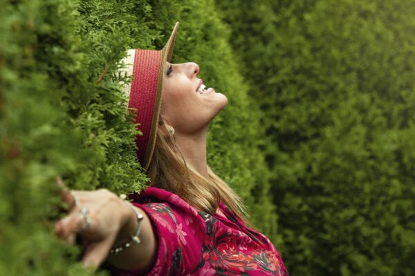 Girl with green grass in the background