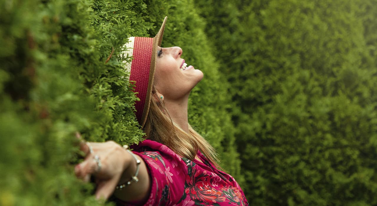 Girl with green grass in the background