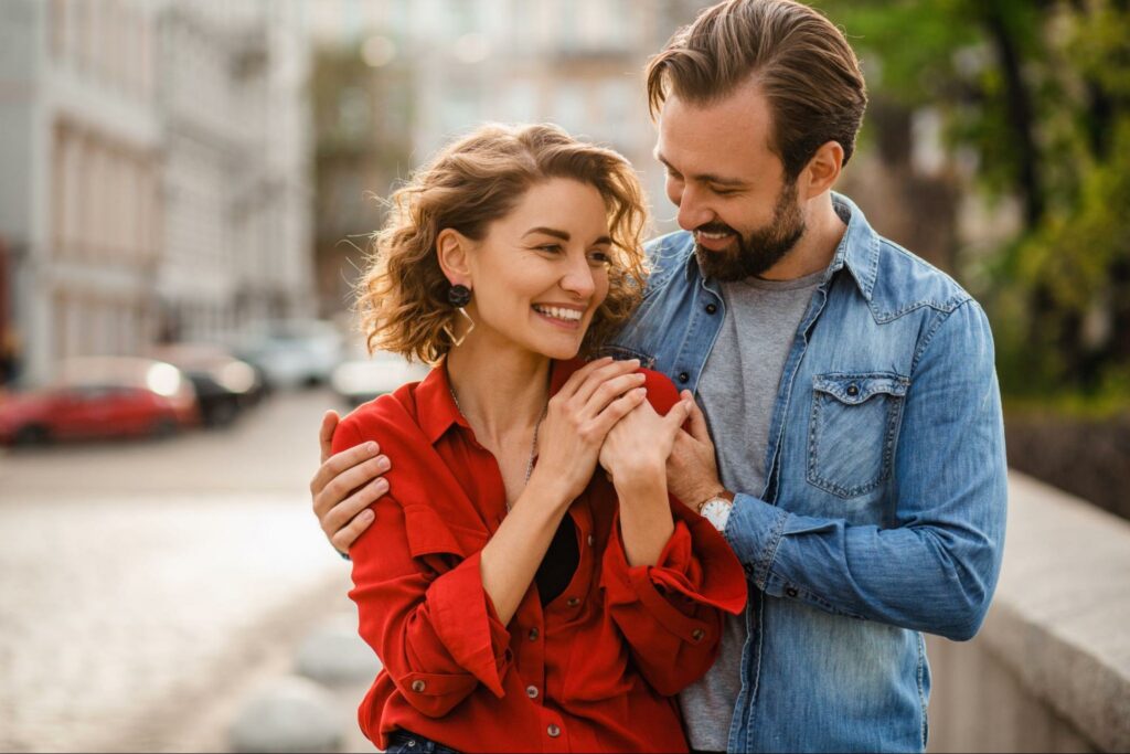 A happy couple hugging