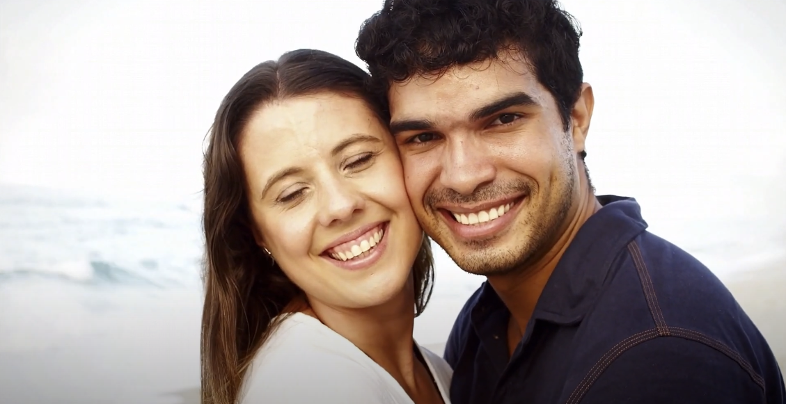 Photo of couples with their faces very close to each other